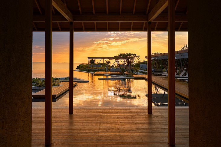 Hoshinoya Okinawa Infinity Pool At Sunset