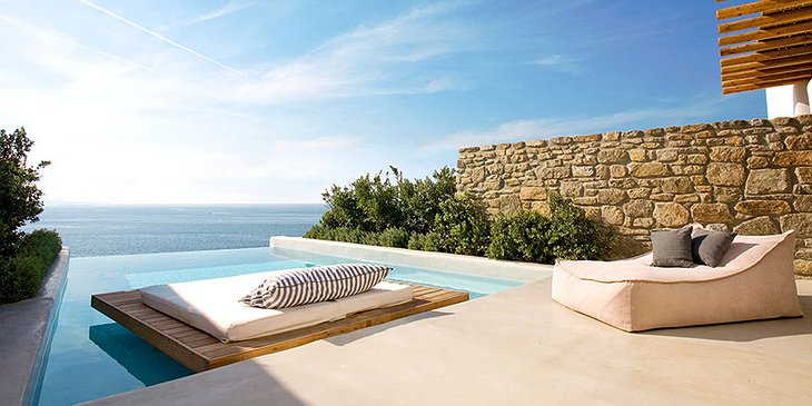 Swimming pool with floating bed