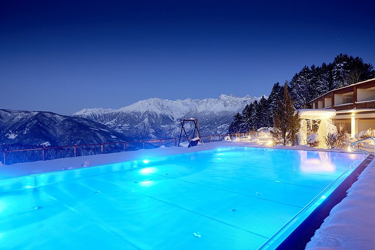 Hotel Chalet Mirabell Outdoor Pool At Night