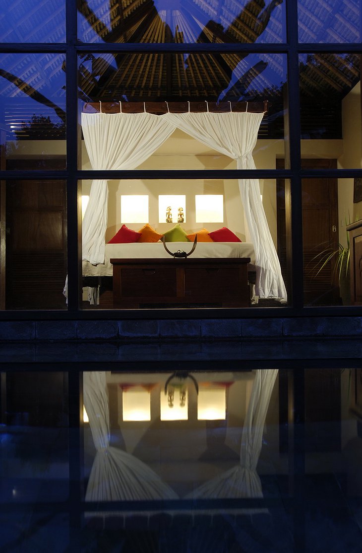 All Villas - bedroom at night from pool
