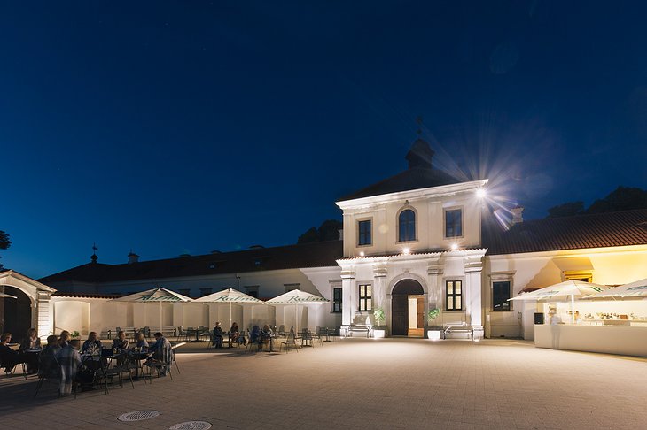 Hotel Monte Pacis building and terrace at night