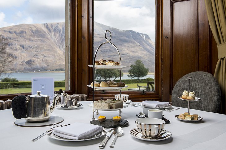 The Torridon Hotel afternoon tea and biscuits with Scottish Highland view