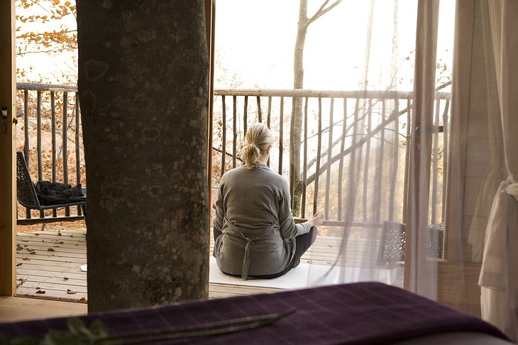 Yoga on the terrace of the tree house