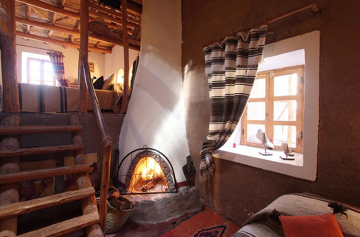 Douar Samra room with a fireplace