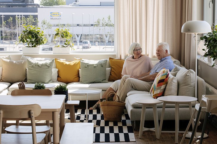 IKEA Hotel Interior With An Elderly Couple