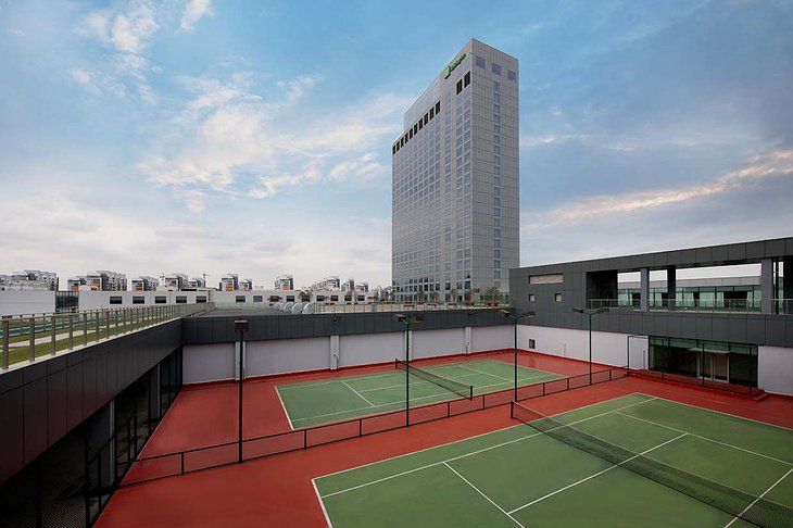 Tennis courts and Holiday Inn Shanghai Pudong Kangqiao