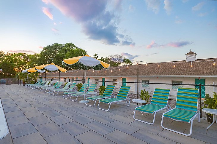 Rye Motor Inn Terrace With Sun Loungers