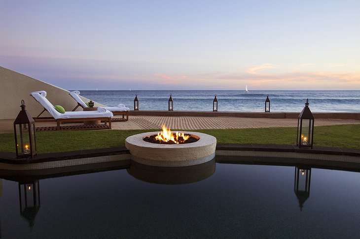 Poolside firepit at dusk