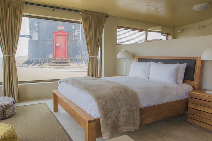 Pelican Point Lodge room with lighthouse view