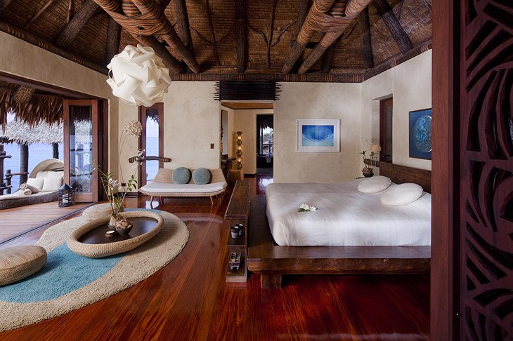 Laucala Island Resort overwater villa bedroom
