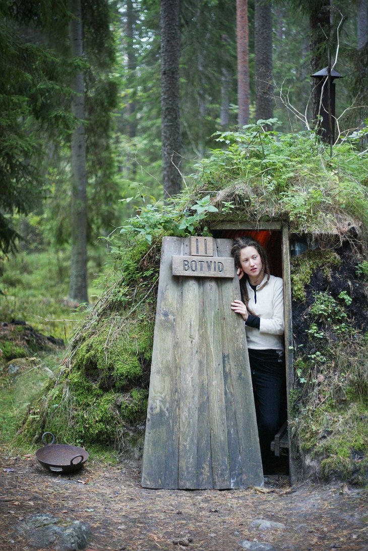 Girl at the entrance of the hut