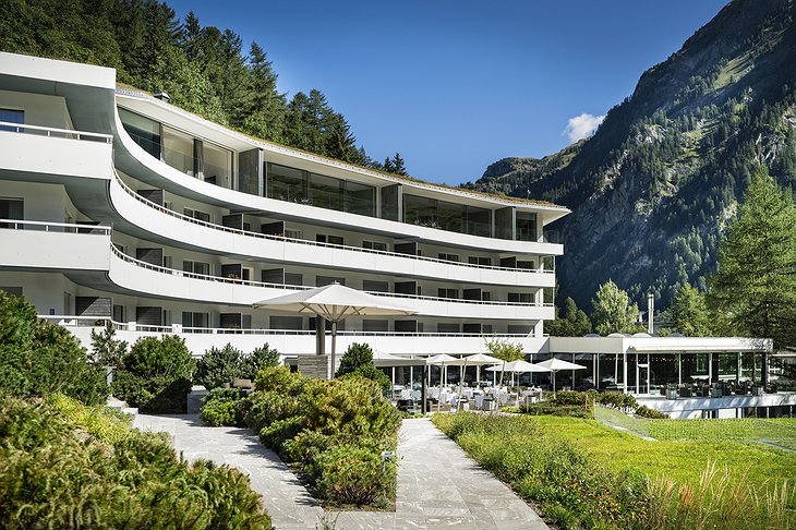 7132 Hotel Building With Alps In The Background