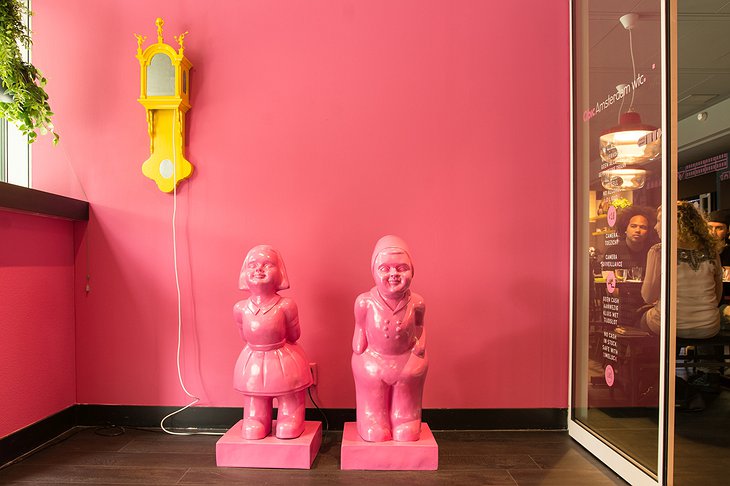 Qbic Hotel WTC Amsterdam entrance pink design statues