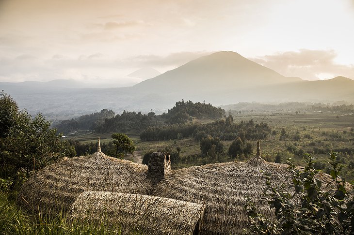 Bisate Lodge building wooden top with views on surrounding volcanoes