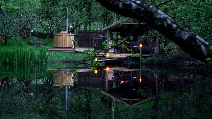 Cabin On The Lake At Night