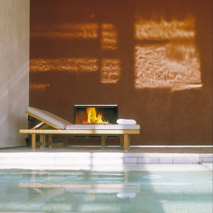 Fireplace at the pool of Vigilius Hotel