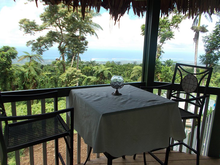 Lupe Sina Treesort dining on the balcony with ocean views