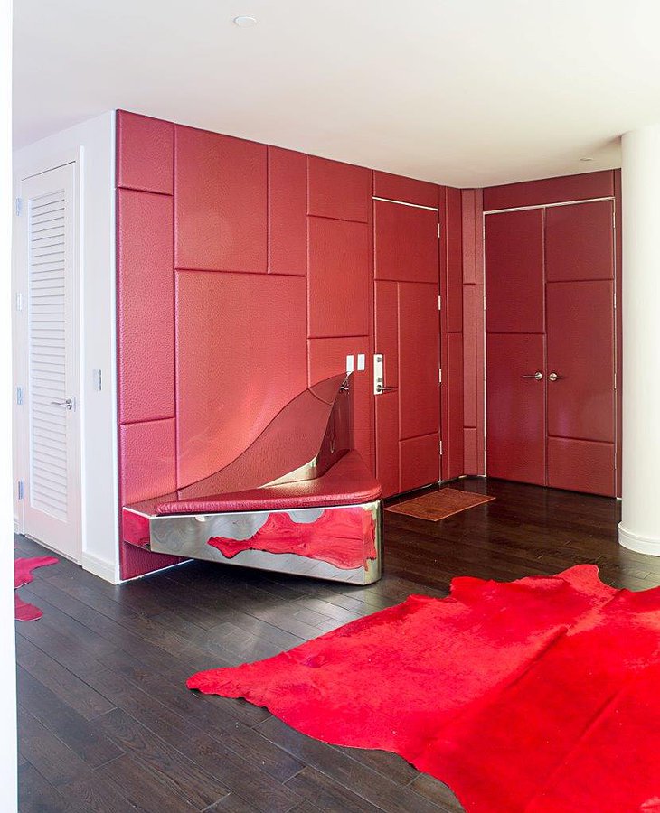 Tribeca apartment red leather walls and door