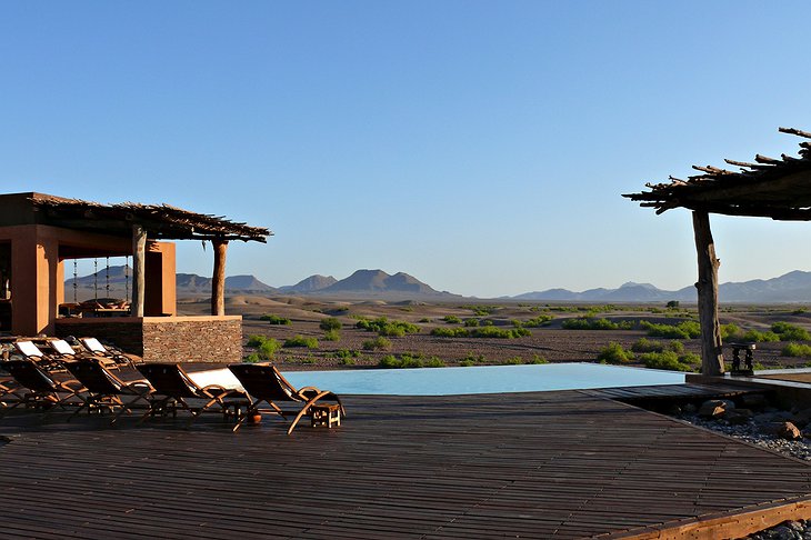 Okahirongo Elephant Lodge infinity pool with panorama on the nature