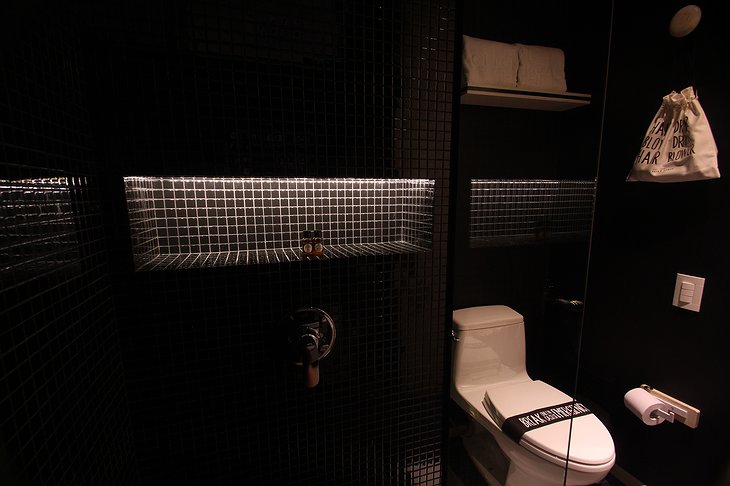Click Clack Hotel extra small room bathroom