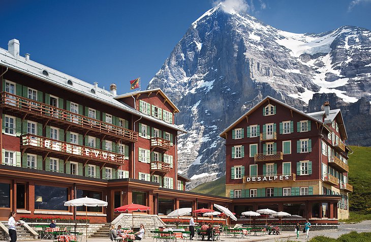 Hotel Bellevue Des Alpes With Alpine Peaks In The Background