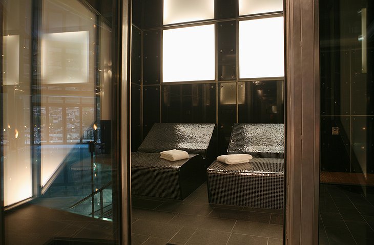 Relax room with heated loungers in the wellness area