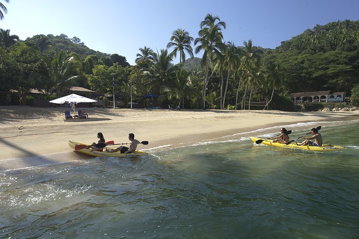 Landing at the beach with kayaks