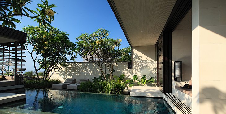 One bedroom villa exterior with pool