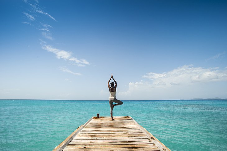 Mustique Island pier yoga