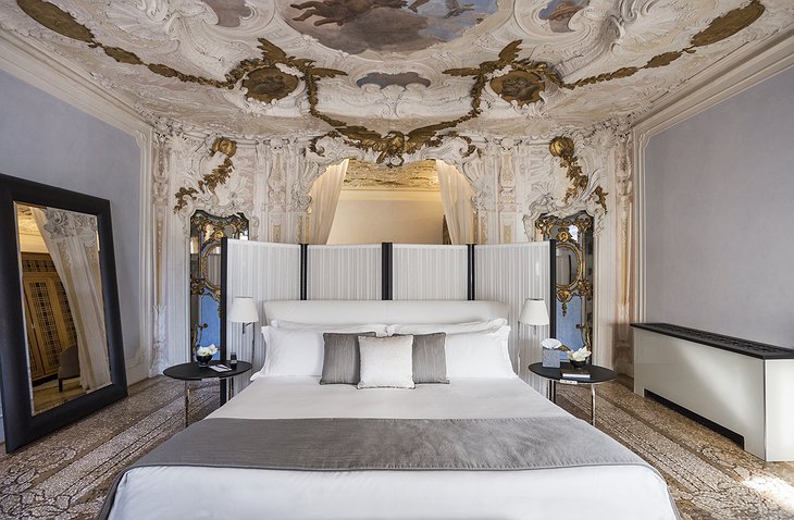 Aman Venice Grand Canal Hotel room with vintage ceiling