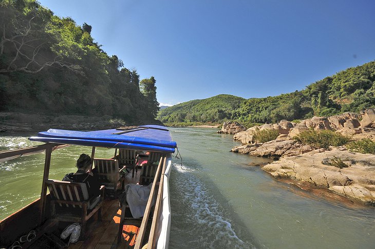 Longtail boat ride on River Nam Pak in Rural Laos